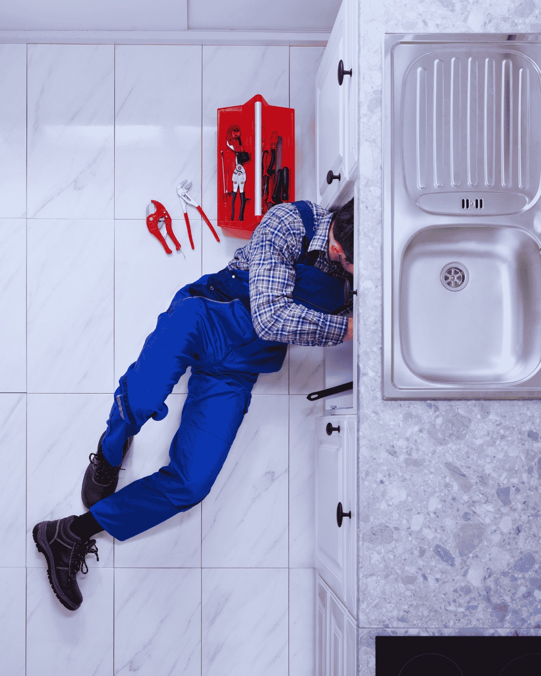 Boynton Beach plumber joining new PEX water lines during a tankless water heater installation